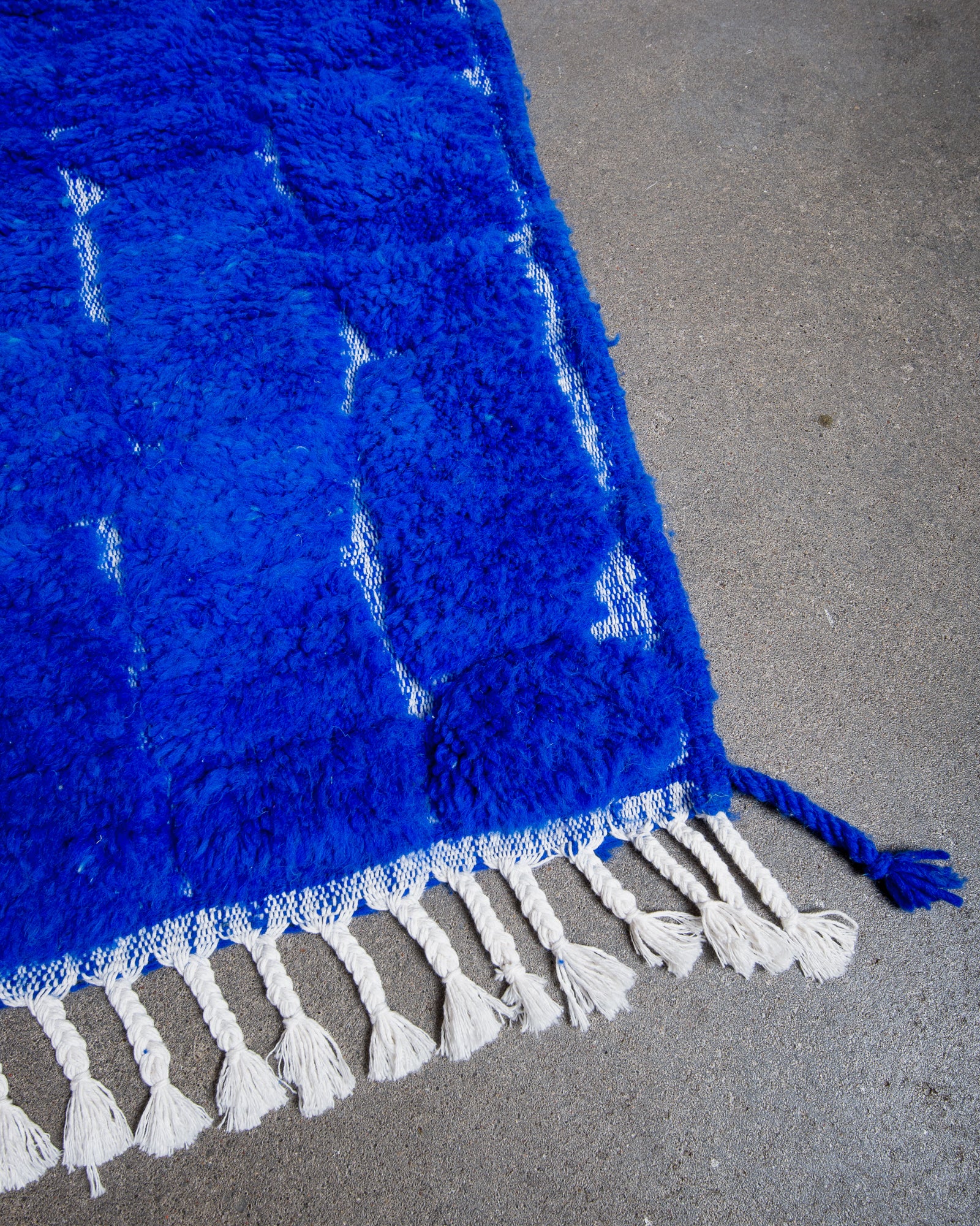 Modern, designer, handcrafted Berber rug from Morocco. Beniourain carpet with beautiful colours and patterns and fluffy wool texture.